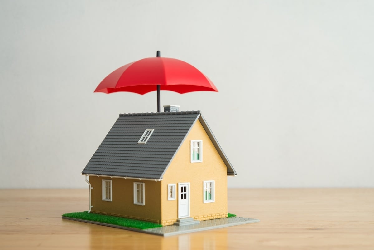 An umbrella over a model home