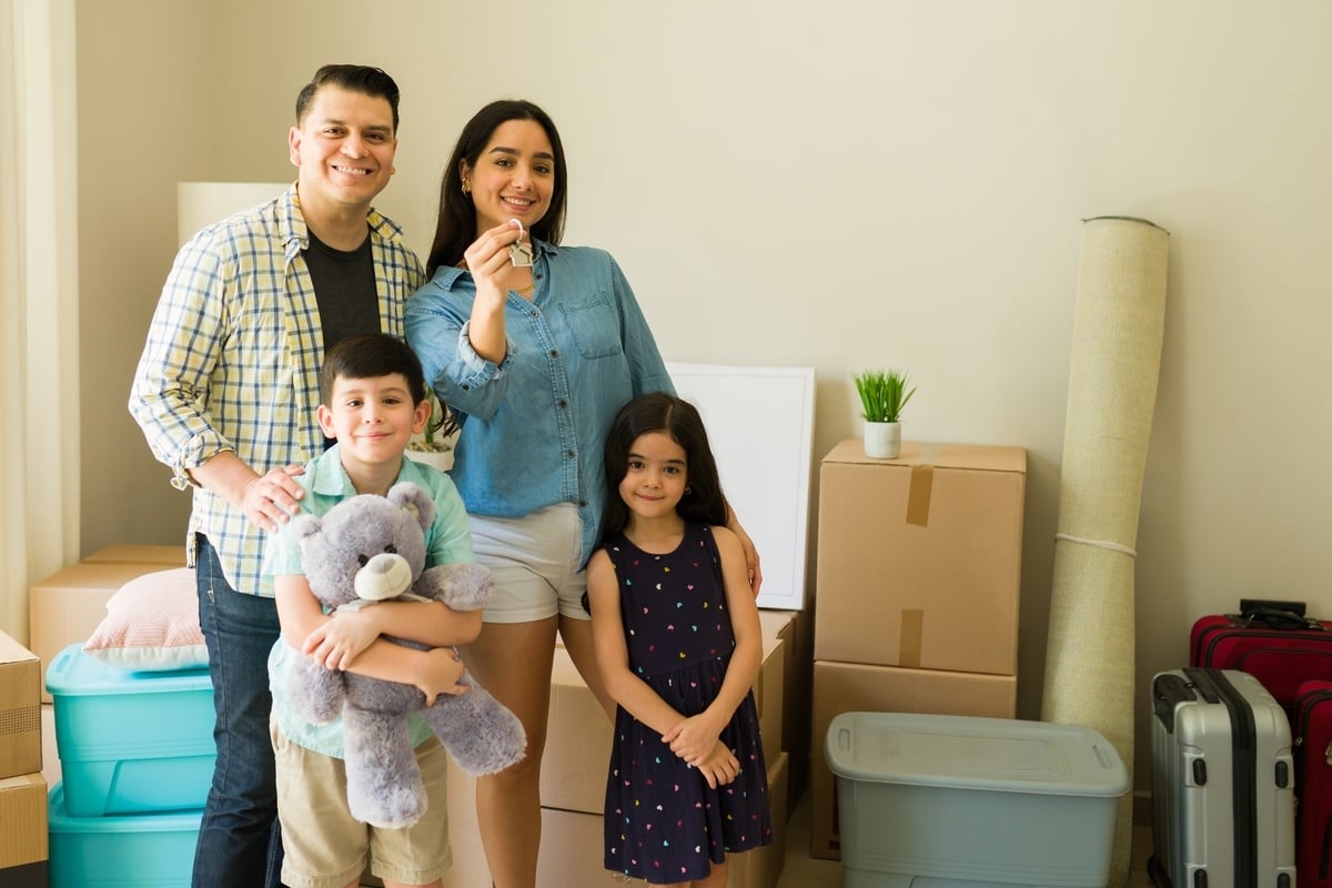 Happy family holding keys